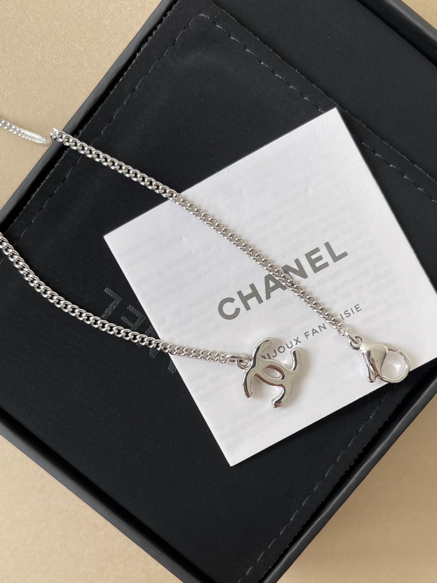 Chanel Silver-Tone CC Logo Oval Pendant Chain Necklace