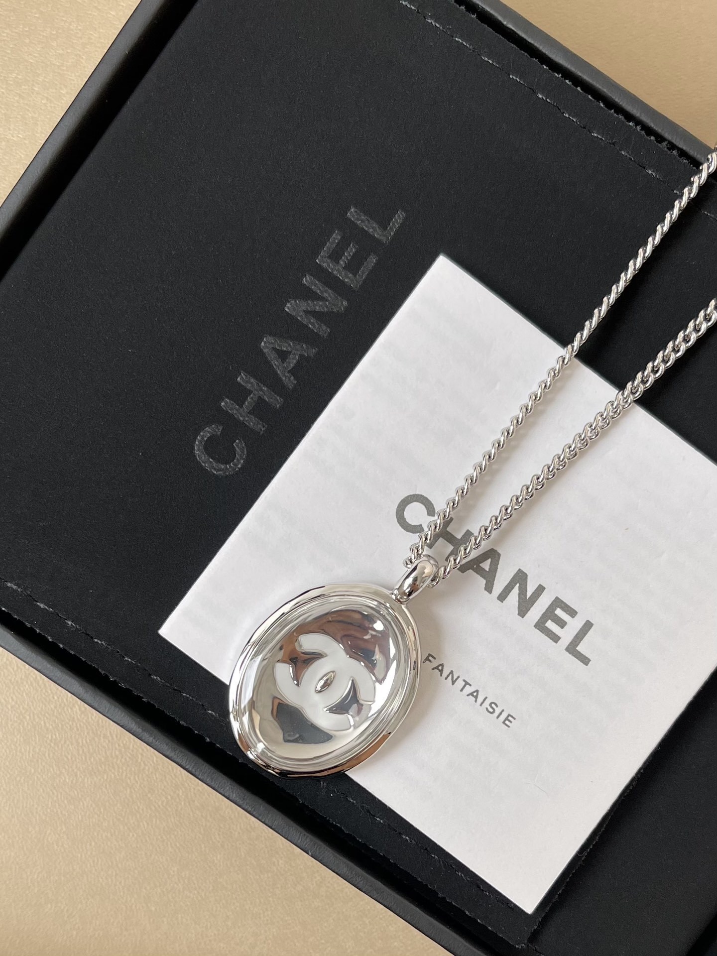 Chanel Silver-Tone CC Logo Oval Pendant Chain Necklace