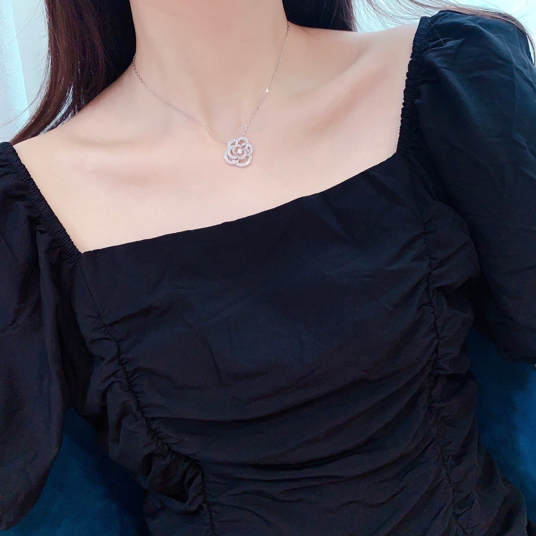 Chanel Camellia Pendant Necklace – Elegant Silver Crystal Jewelry