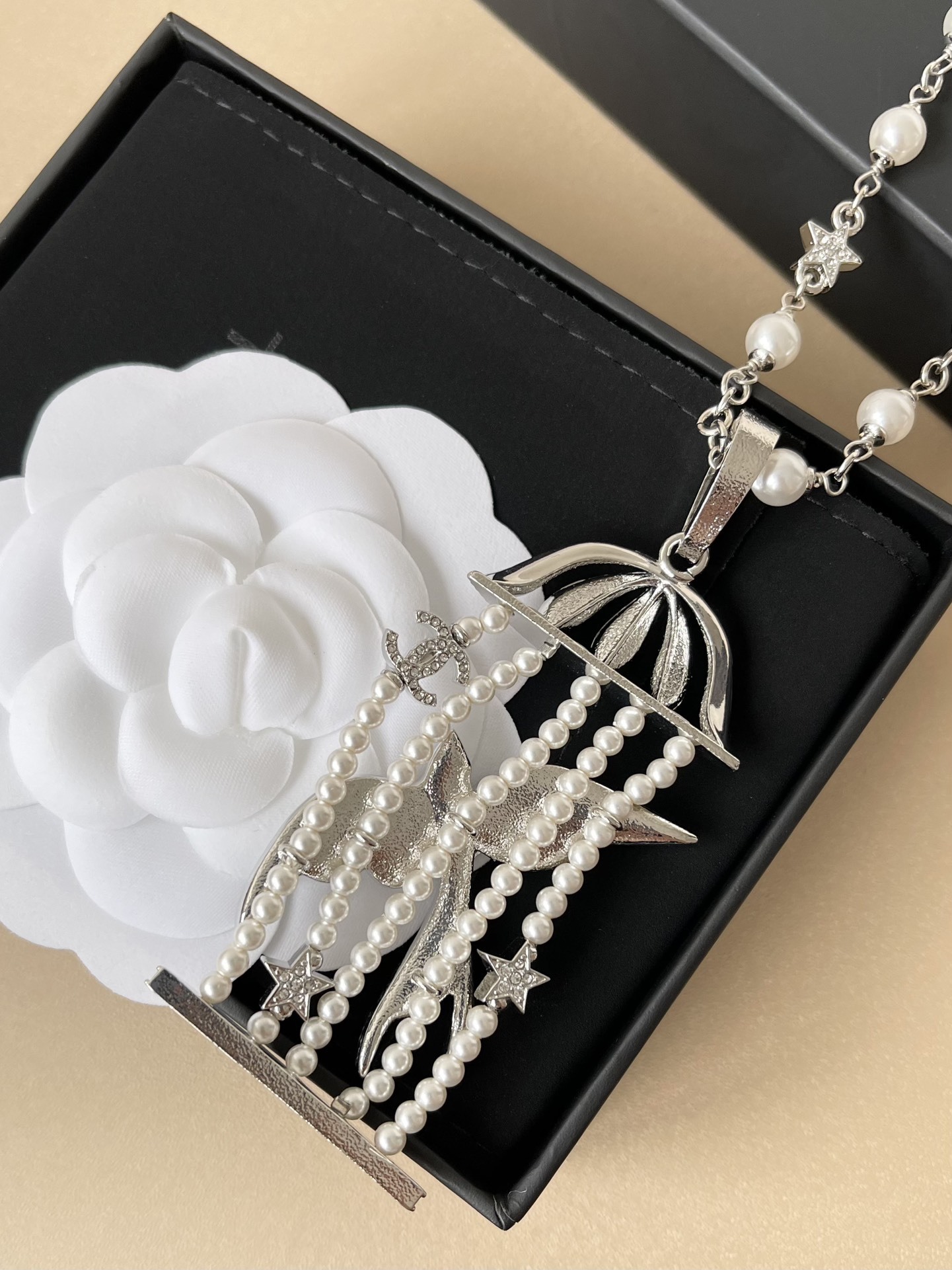 Luxury Birdcage Pearl Necklace with Crystal Stars and CC Pendant