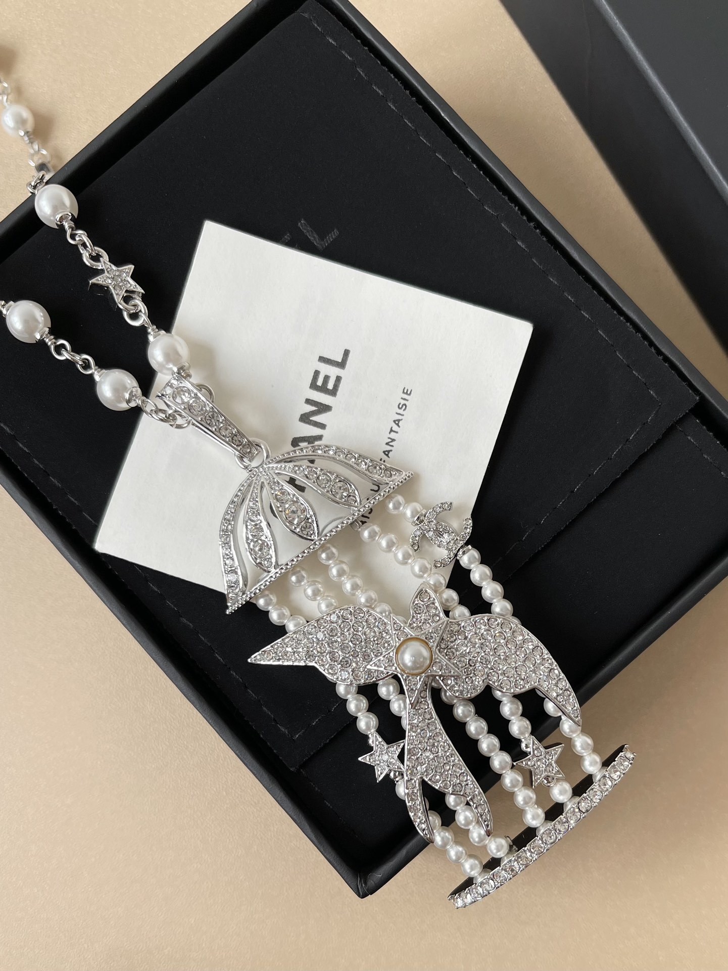 Luxury Birdcage Pearl Necklace with Crystal Stars and CC Pendant