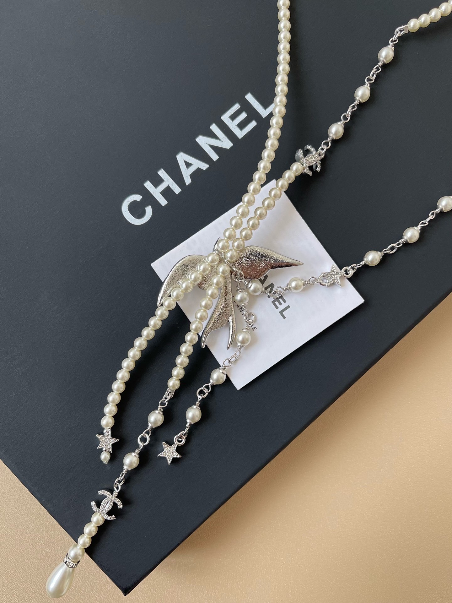Luxury Pearl Necklace with Crystal Bow and Star Charms