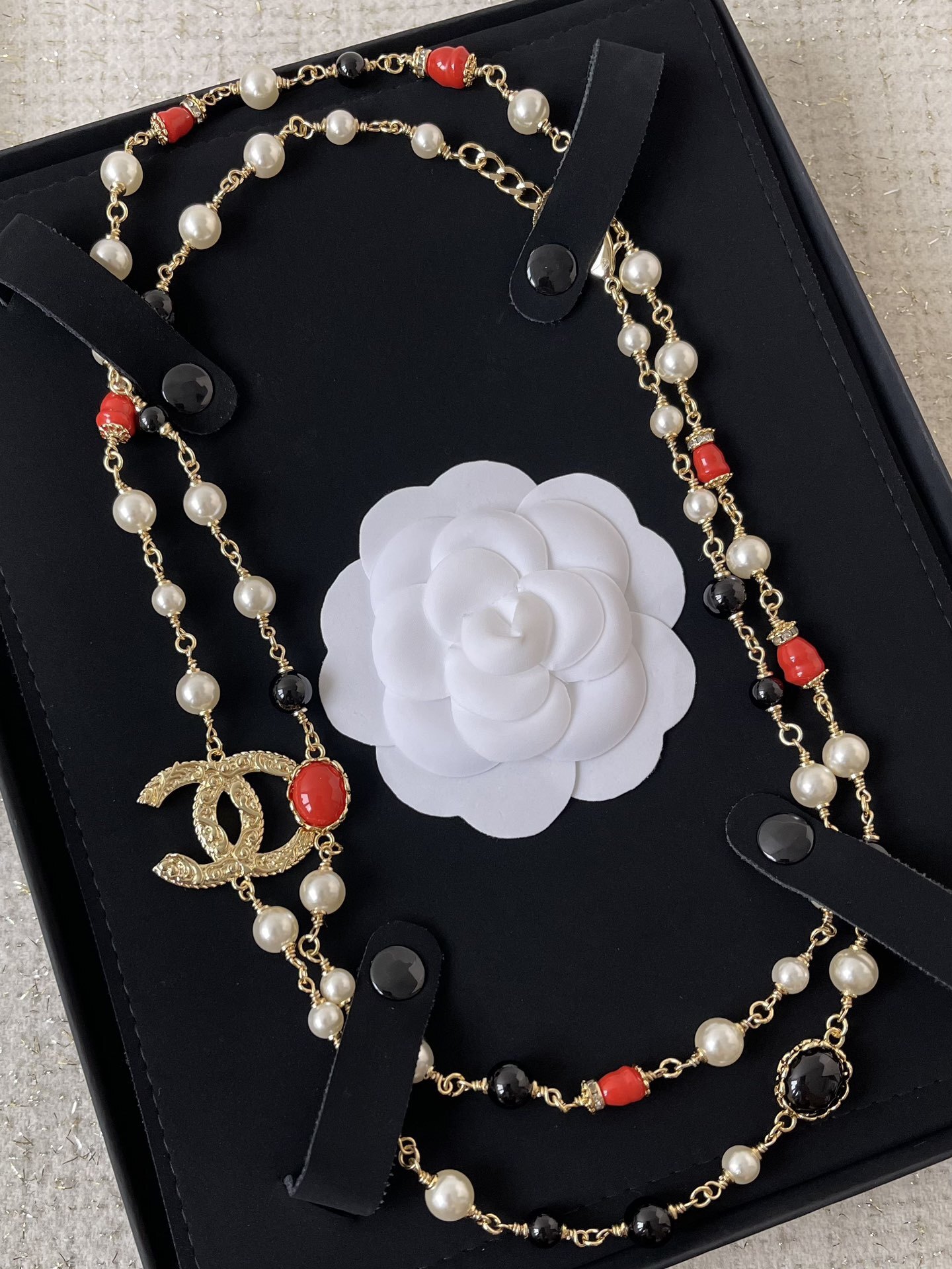 Elegant Gold CC Pearl Long Necklace - Red & Black Bead Detail