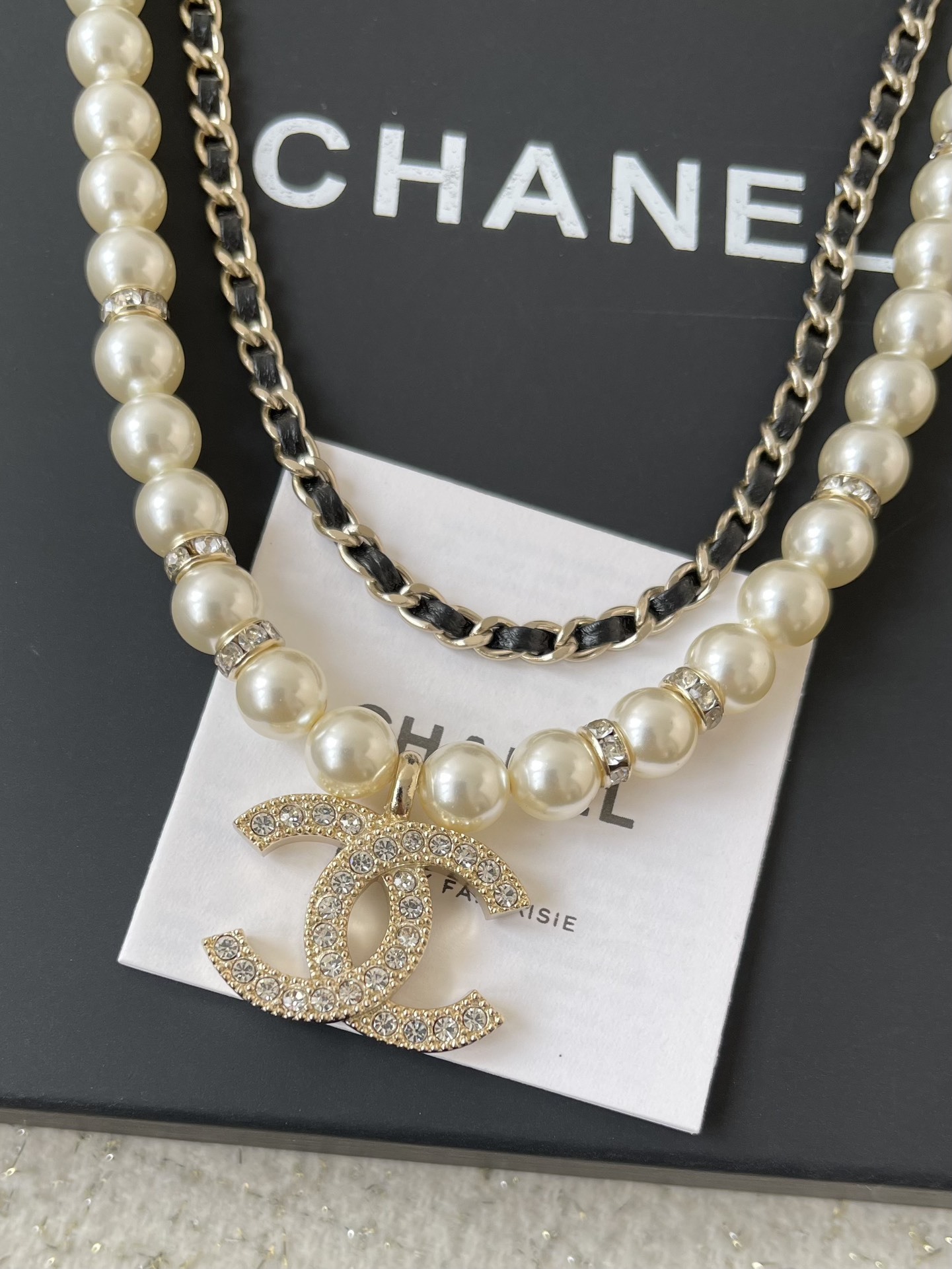 Elegant Layered Pearl Necklace with Crystal Logo Pendant & Gold Chain