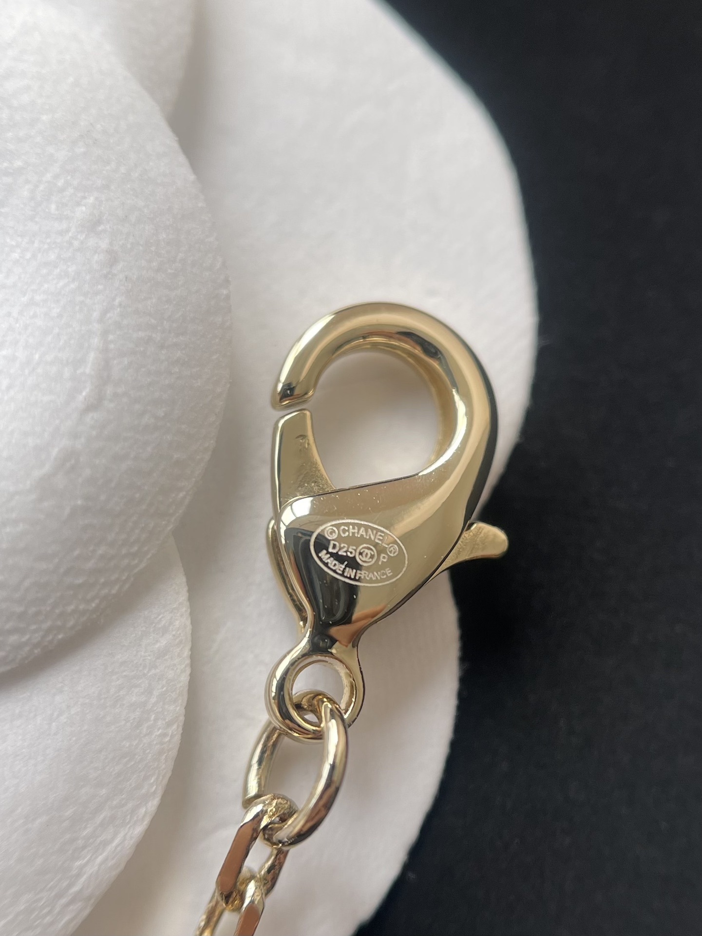 Elegant Gold-Tone Crystal Bow & CC Logo Pendant Necklace