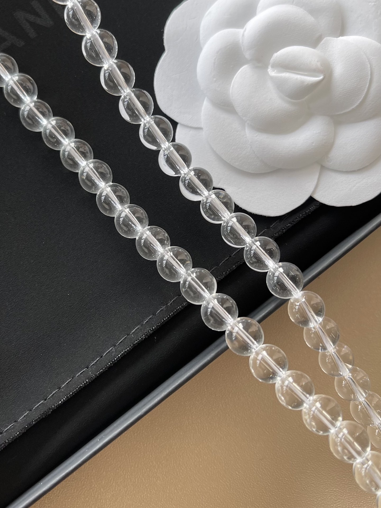 Luxury Chanel Clear Beaded Long Necklace with CC Logo and Bows