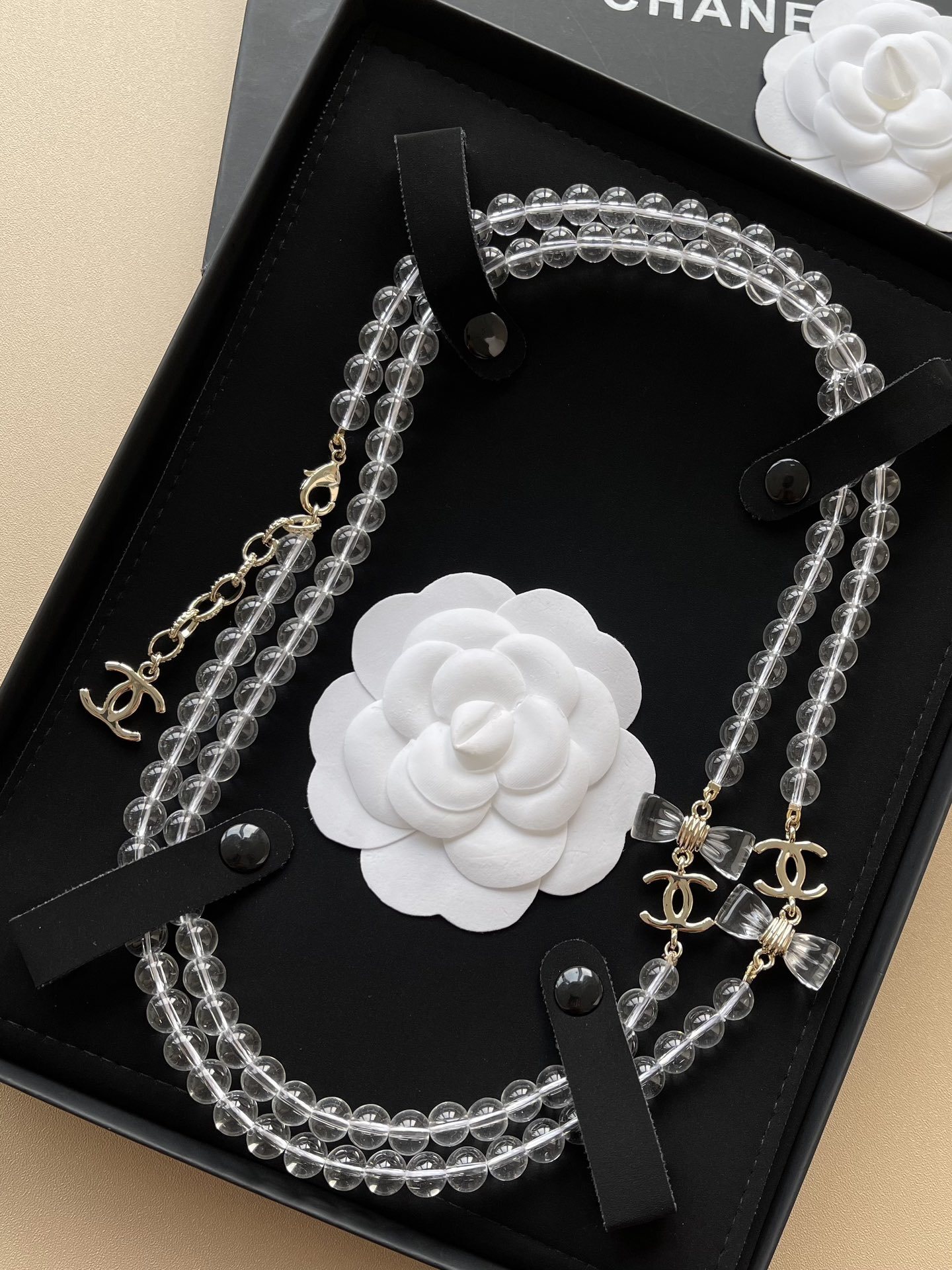 Luxury Chanel Clear Beaded Long Necklace with CC Logo and Bows