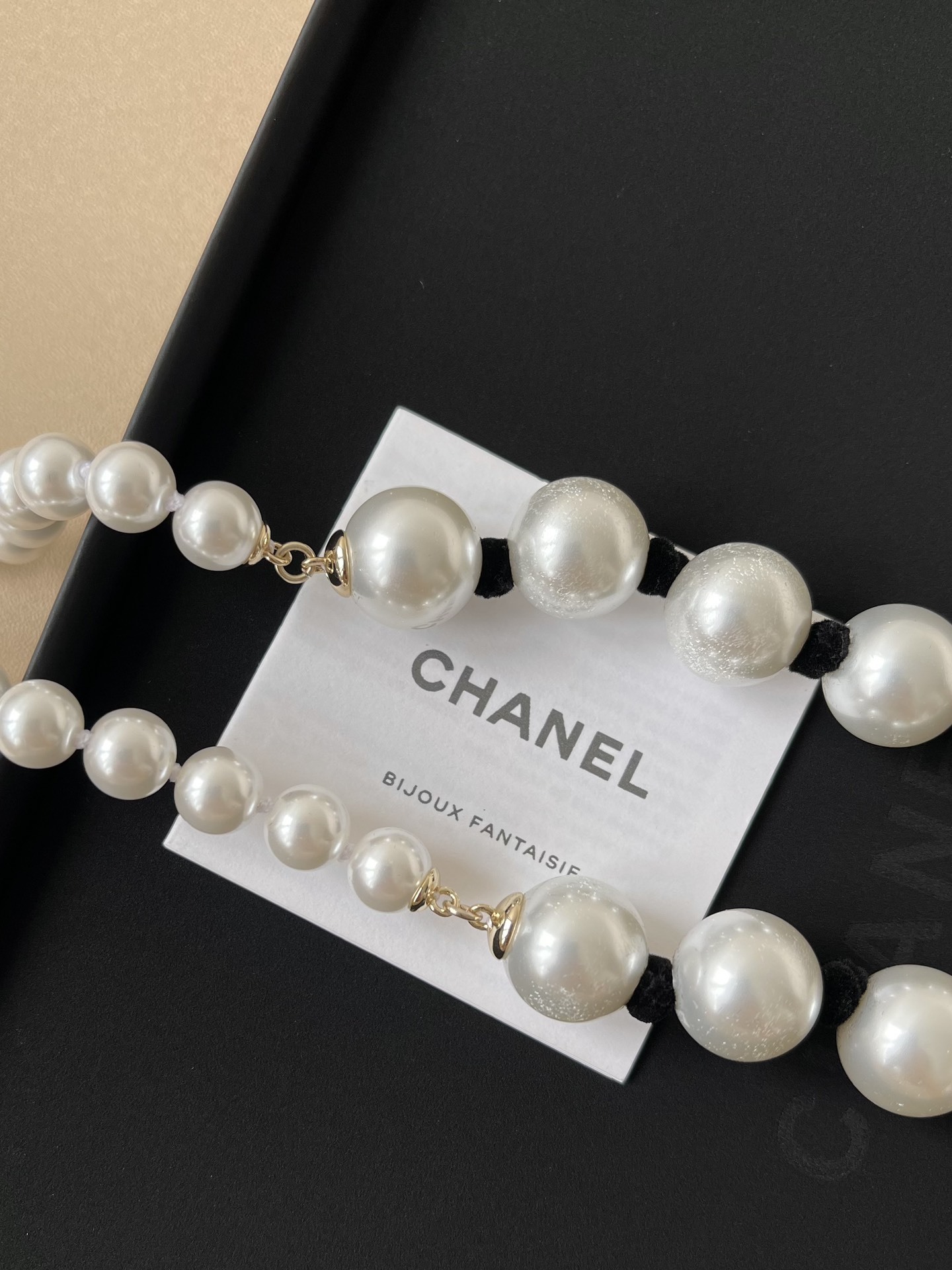 Chanel 2025 Cruise Long Pearl Necklace with Black Silk & CC Logo