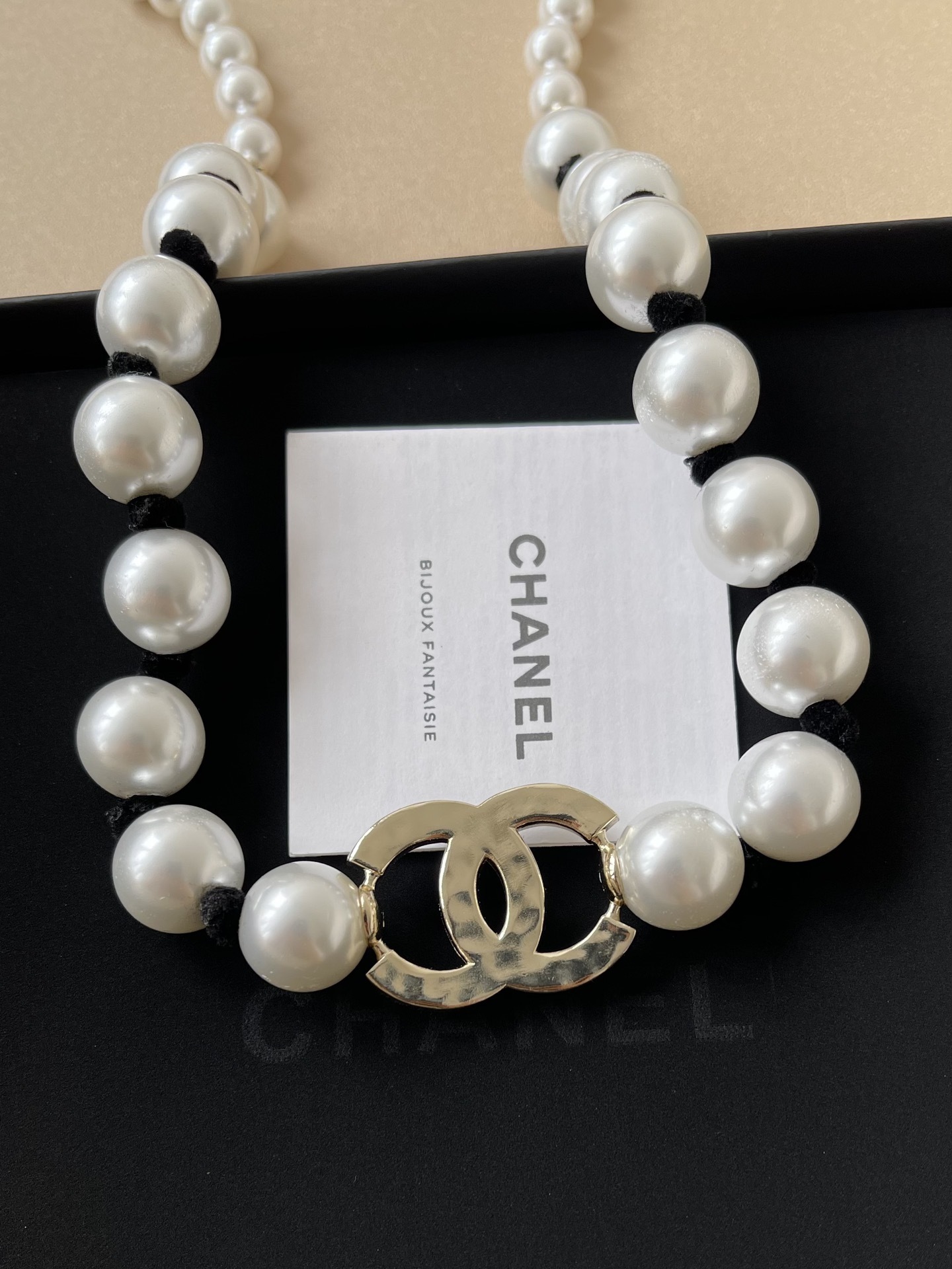 Chanel 2025 Cruise Long Pearl Necklace with Black Silk & CC Logo