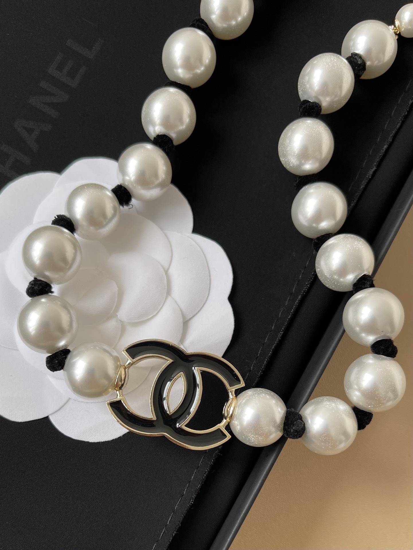 Chanel 2025 Cruise Long Pearl Necklace with Black Silk & CC Logo