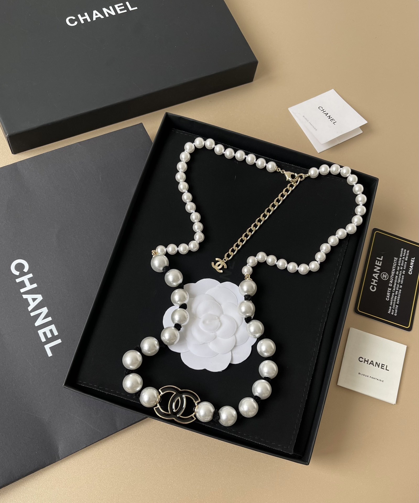 Chanel 2025 Cruise Long Pearl Necklace with Black Silk & CC Logo