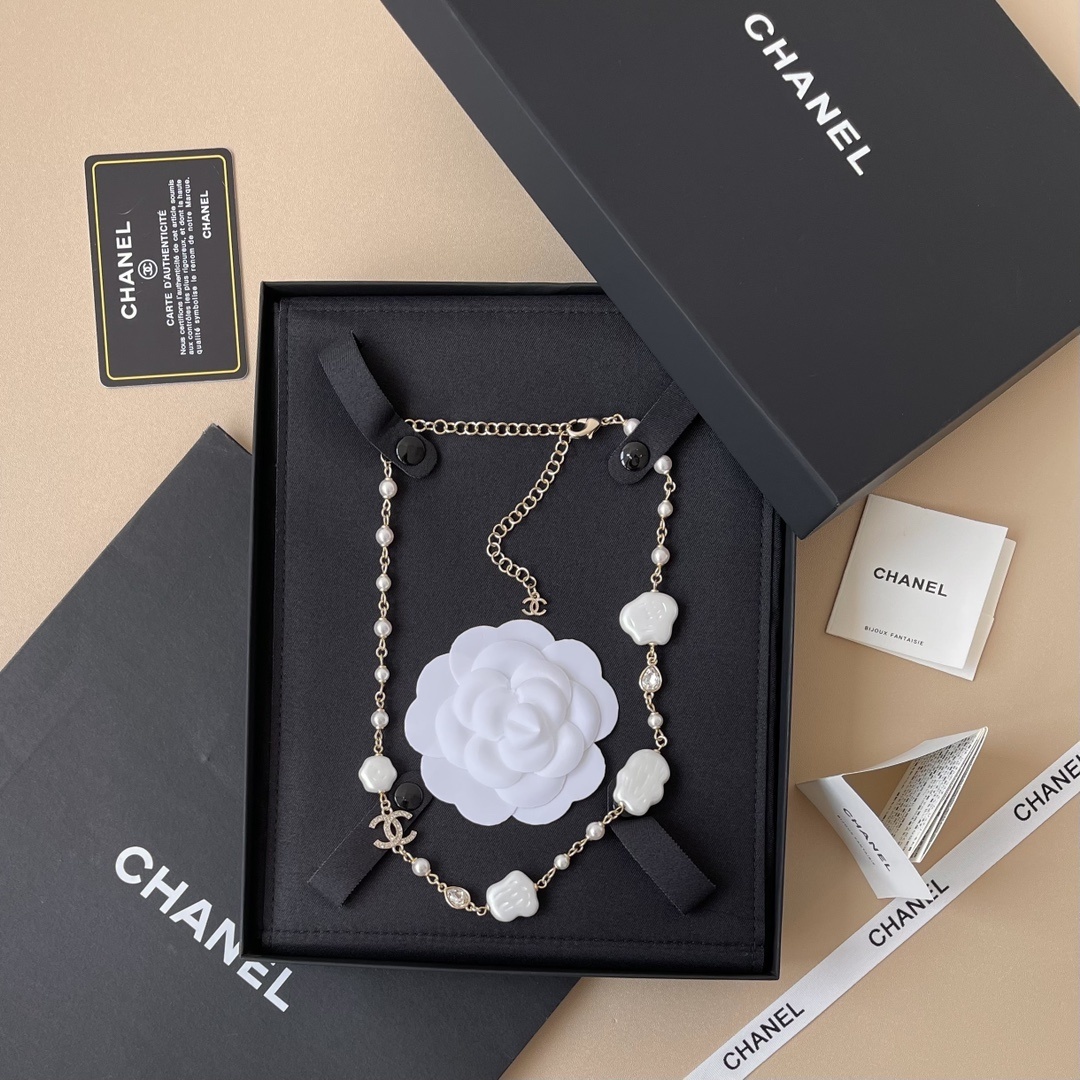 Chanel Gold Pearl Necklace with Crystal CC Logo & Cloud Charms