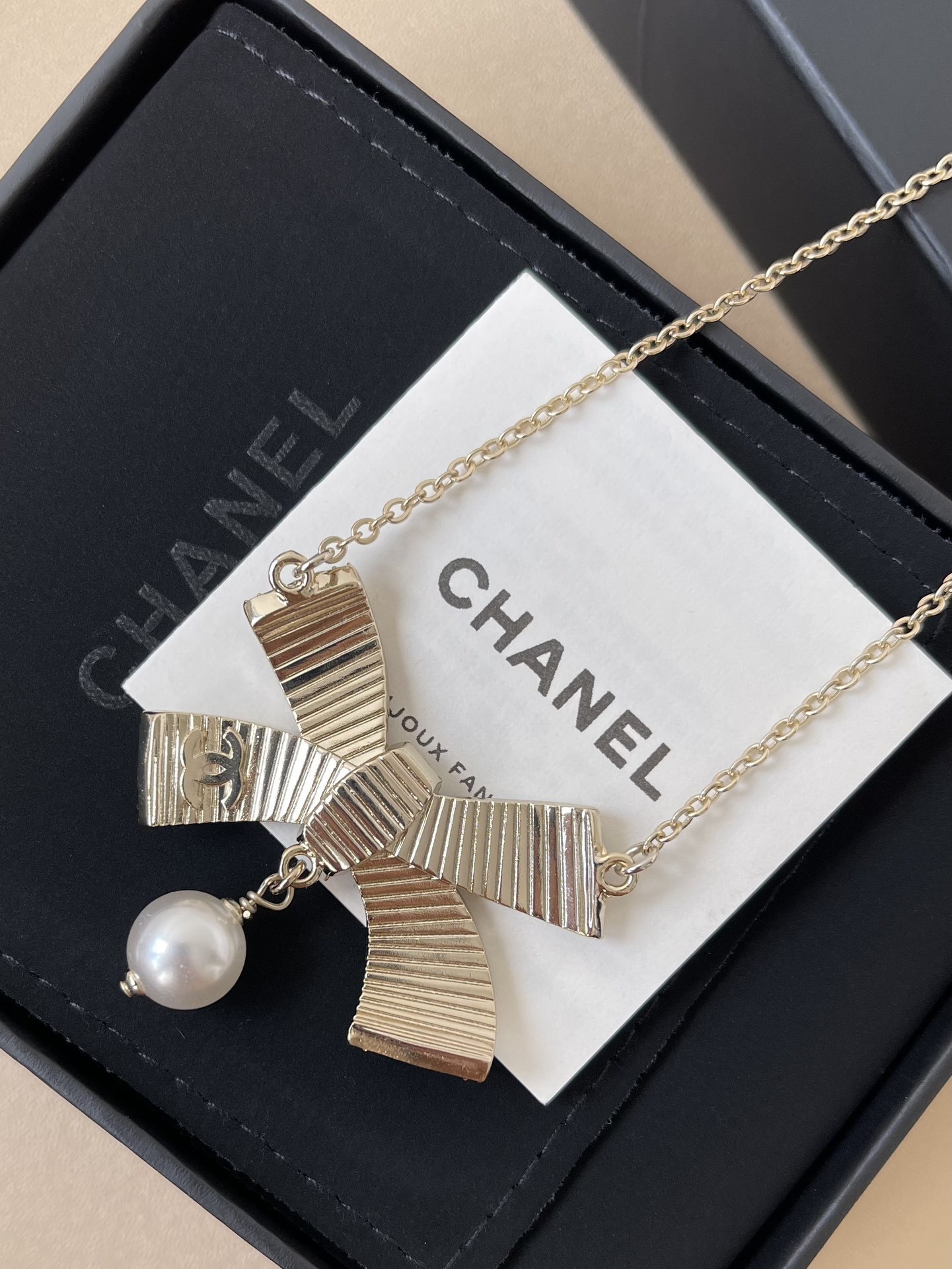 Luxury Bow Pearl Necklace with Crystal CC Logo & Elegant Packaging