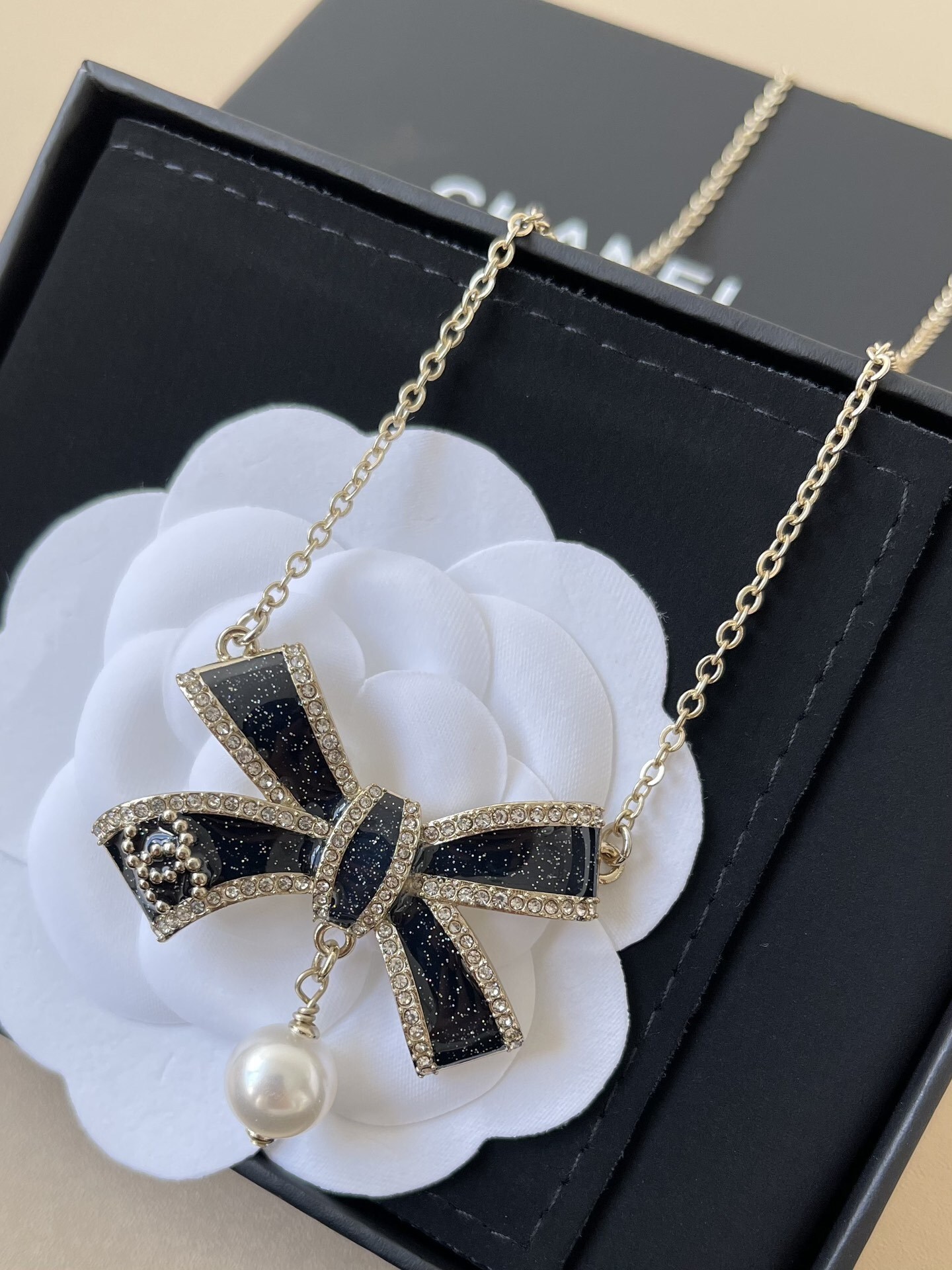 Luxury Bow Pearl Necklace with Crystal CC Logo & Elegant Packaging