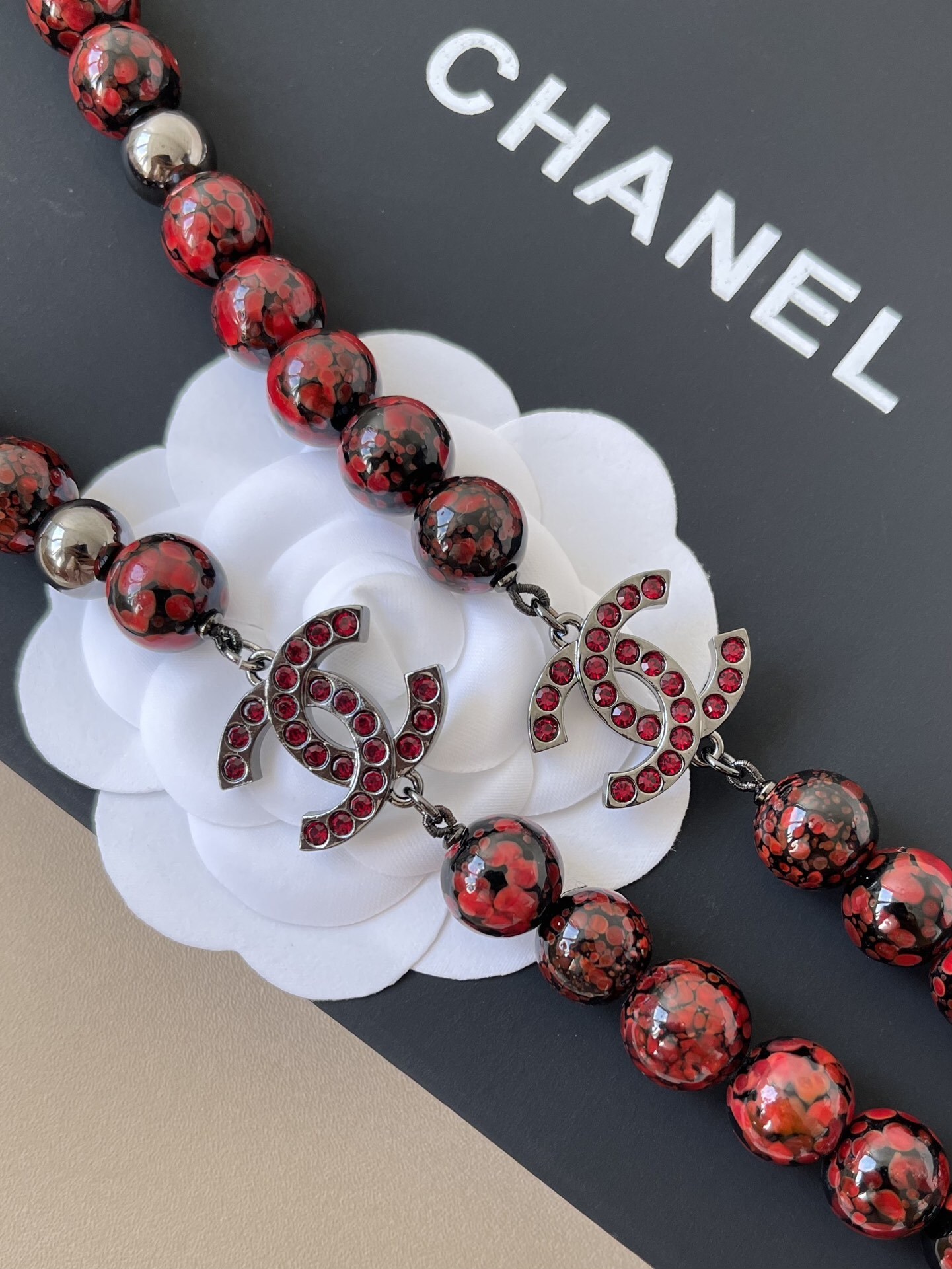Elegant Long Red & Black Marbled Bead Necklace with Crystal CC Charms