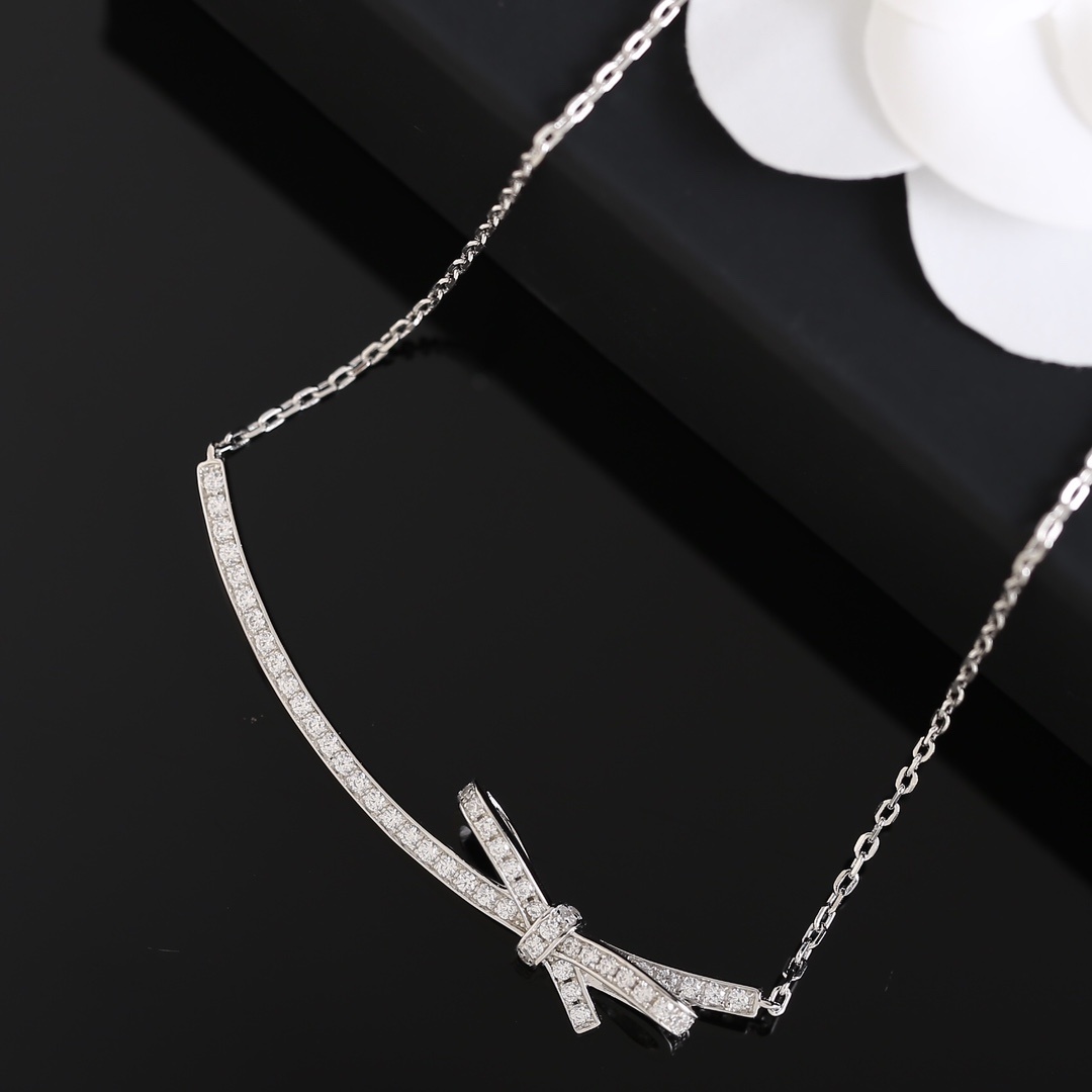 Elegant Chanel Bow Ribbon Crystal Pavé Necklace in Silver