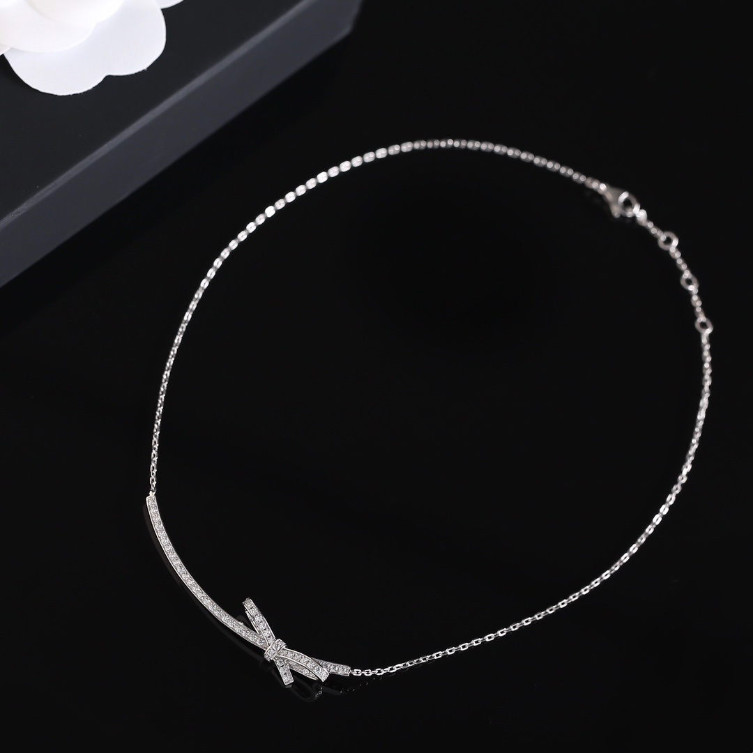Elegant Chanel Bow Ribbon Crystal Pavé Necklace in Silver