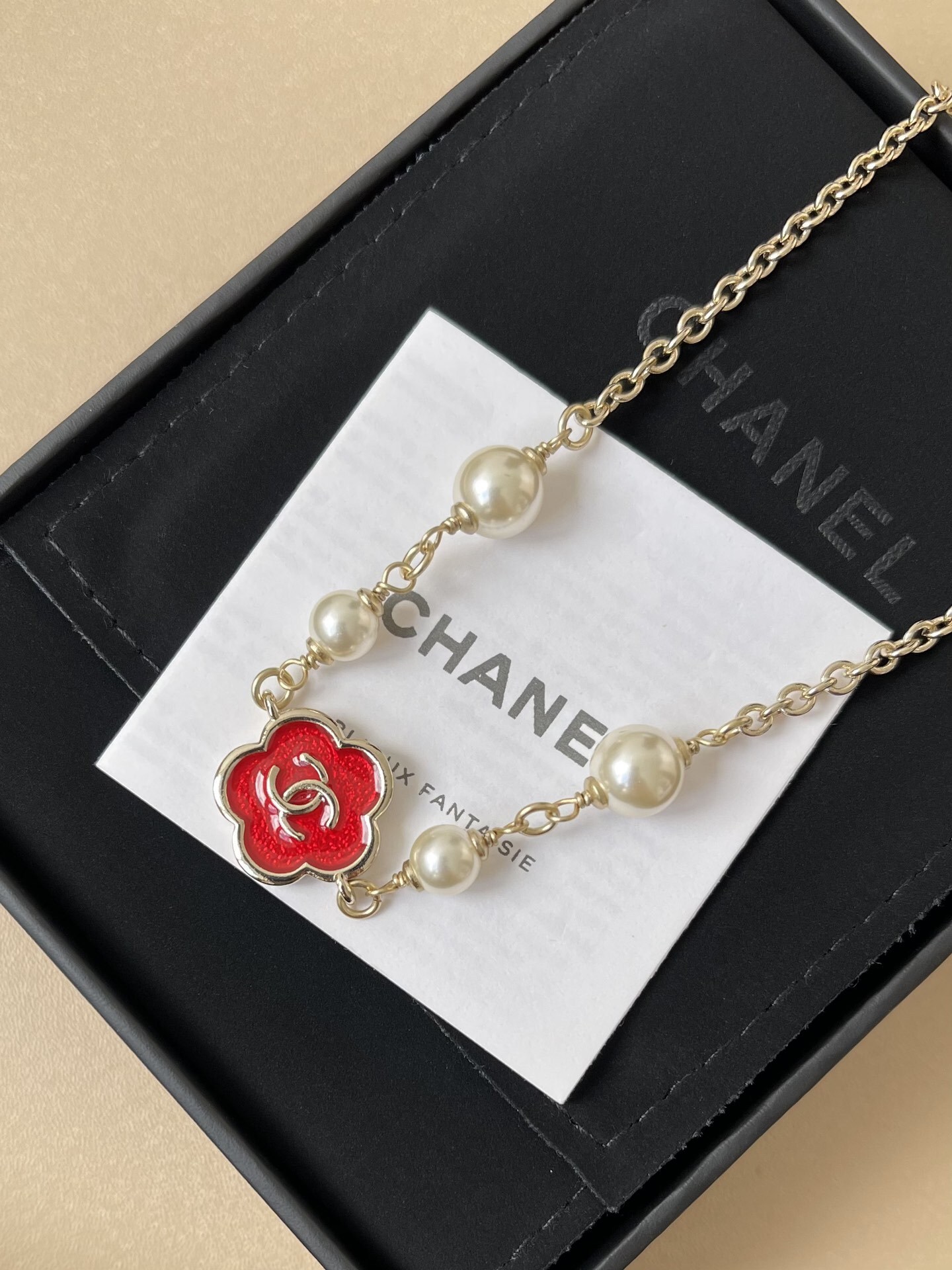 Chanel Red Camellia Pearl Necklace - Elegant CC Logo Gold Jewelry