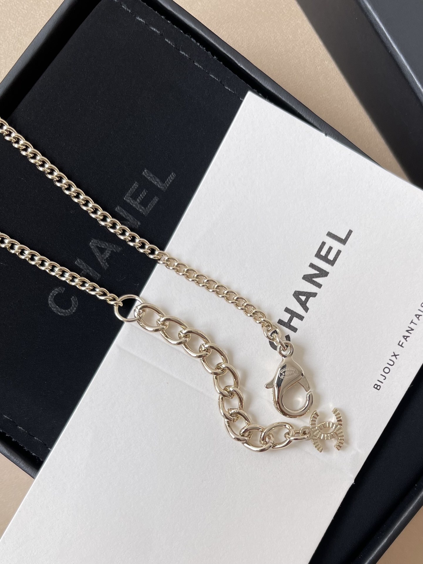 Chanel Gold-Tone Crystal Script Logo & Star Charm Necklace
