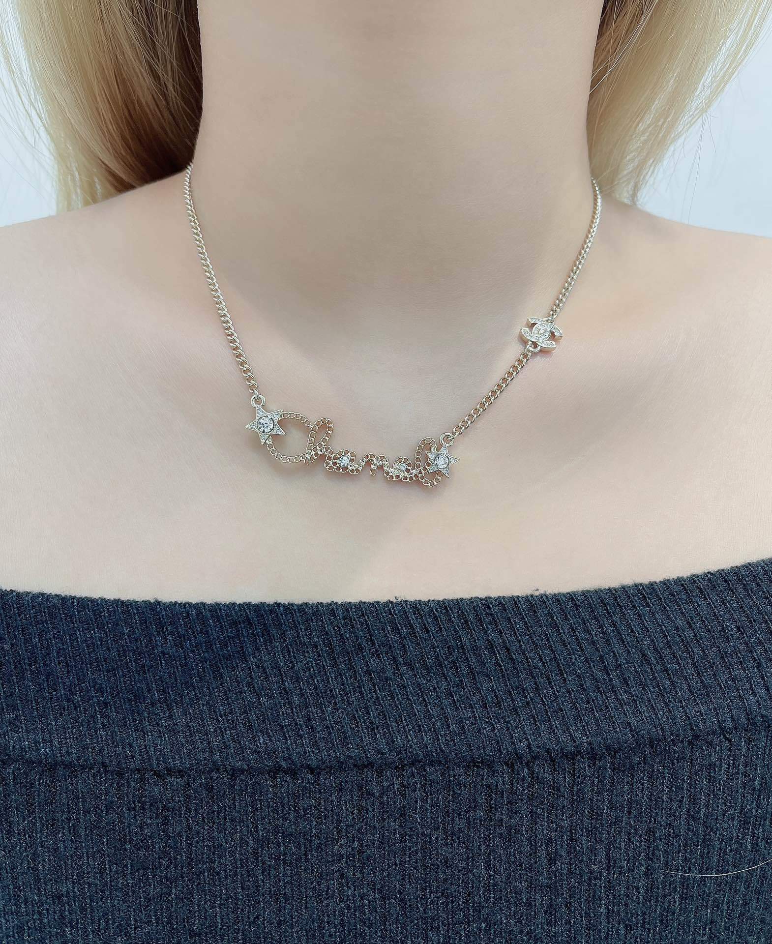 Chanel Gold-Tone Crystal Script Logo & Star Charm Necklace