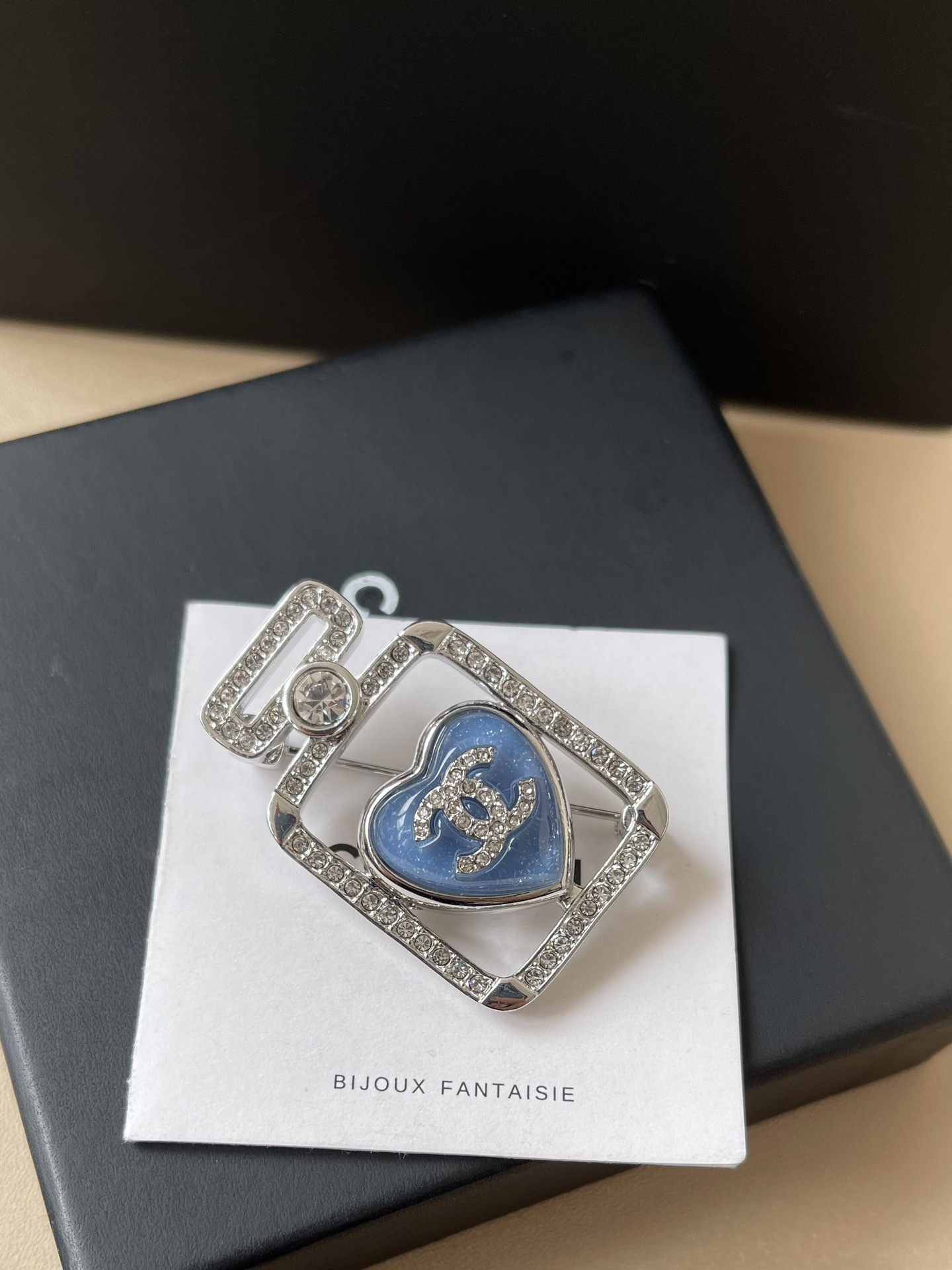 Luxury Crystal Perfume Bottle Brooch with Blue Heart Logo