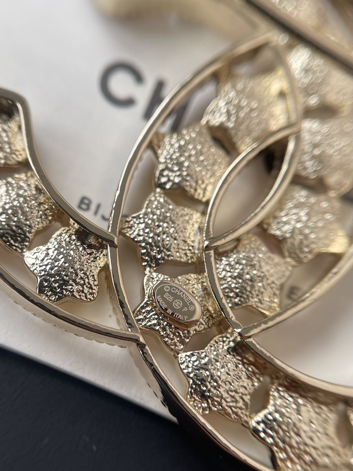 Elegant Gold CC Brooch with Multi-Color Star Crystals