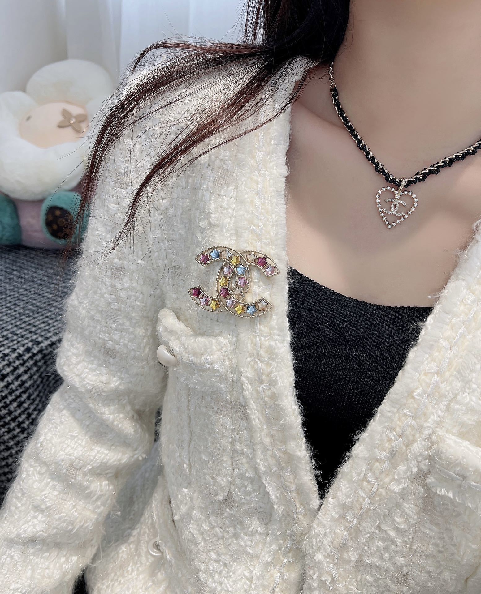 Elegant Gold CC Brooch with Multi-Color Star Crystals