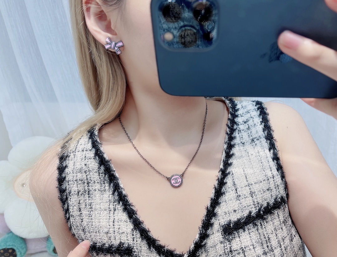 Chanel Pink Enamel Bow Earrings with Crystal Stud Accents