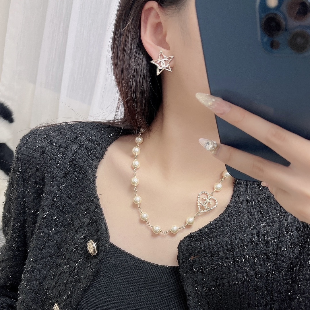 Luxury Gold Star Stud Earrings with Double C Logo Detail