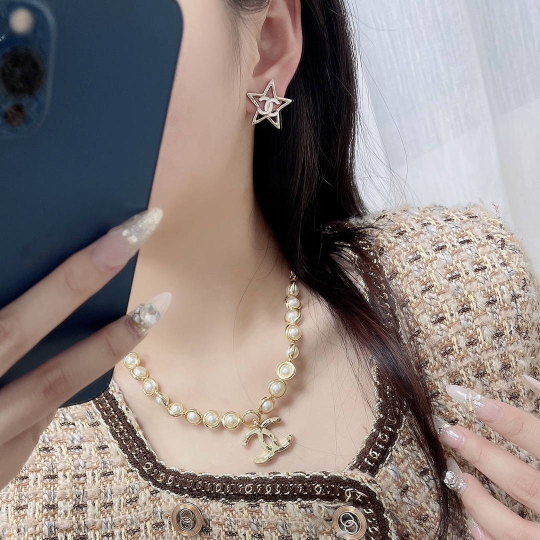 Luxury Gold Star Stud Earrings with Double C Logo Detail