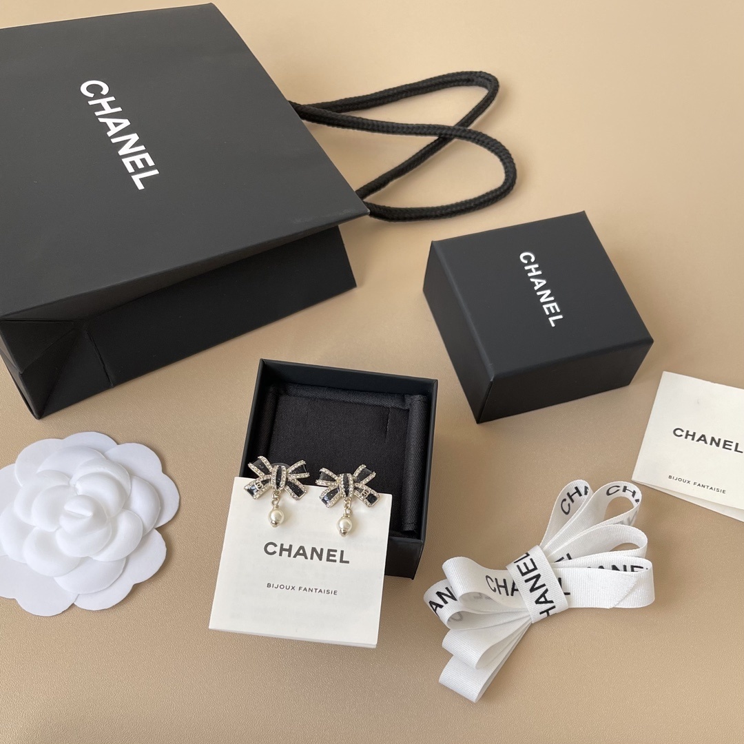 Chanel Black Enamel Bow Earrings with Crystal and Pearl Drop