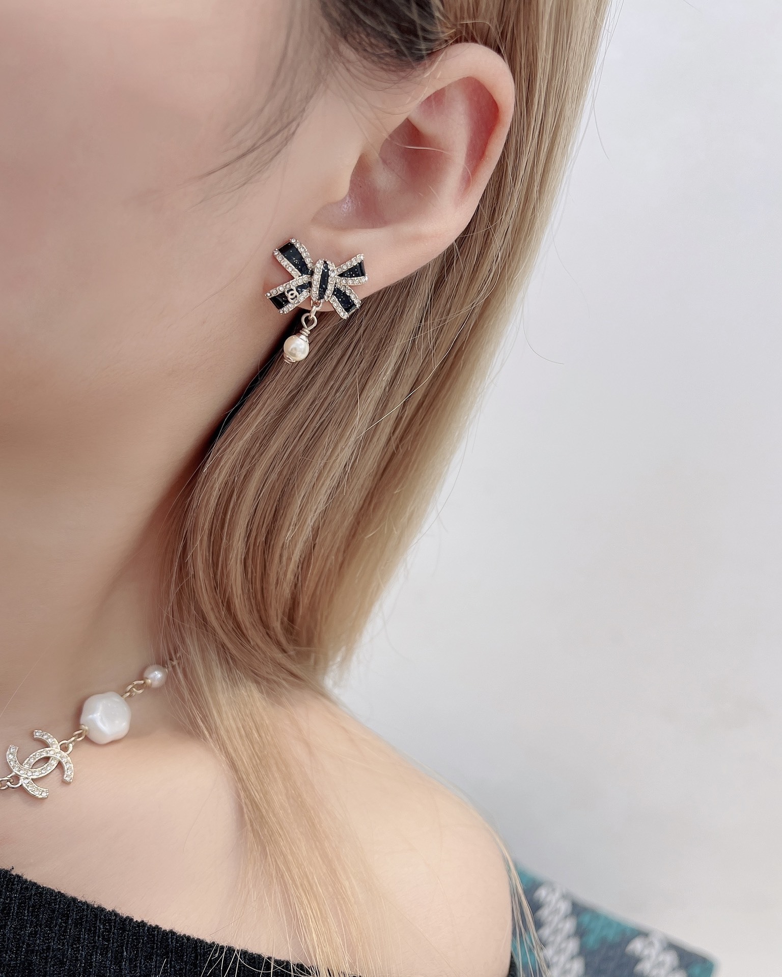 Chanel Black Enamel Bow Earrings with Crystal and Pearl Drop