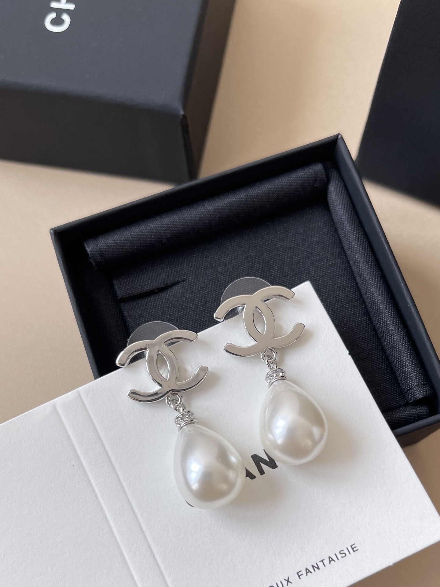 Chanel Silver CC Logo Teardrop Pearl Dangle Earrings - Luxury Jewelry