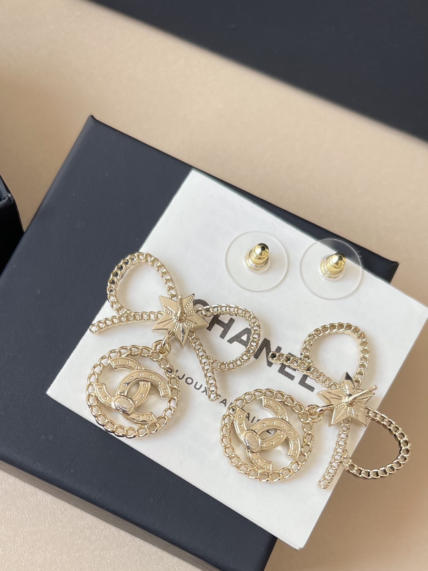 Luxury Chanel Bow & Star CC Logo Crystal Drop Earrings - Gold Tone