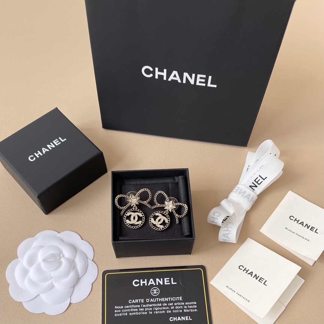 Luxury Chanel Bow & Star CC Logo Crystal Drop Earrings - Gold Tone