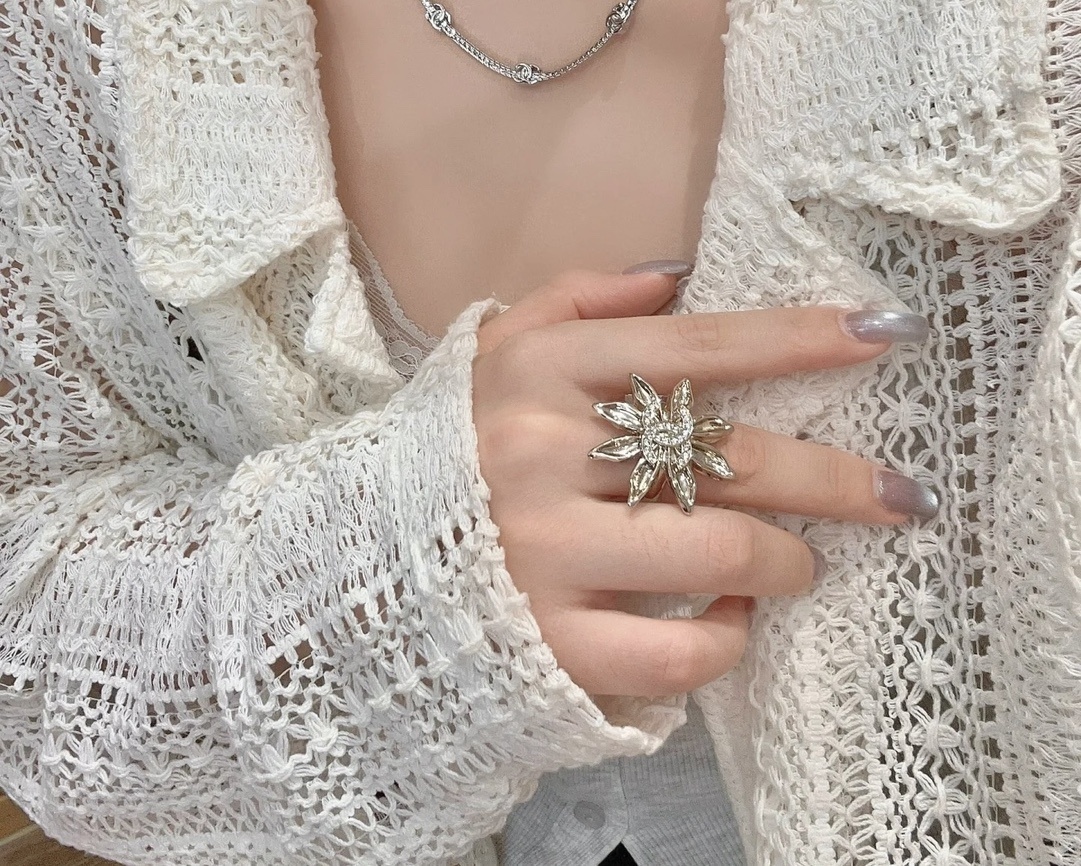 Chanel Crystal Flower Statement Ring - Elegant Gold-Tone Jewelry