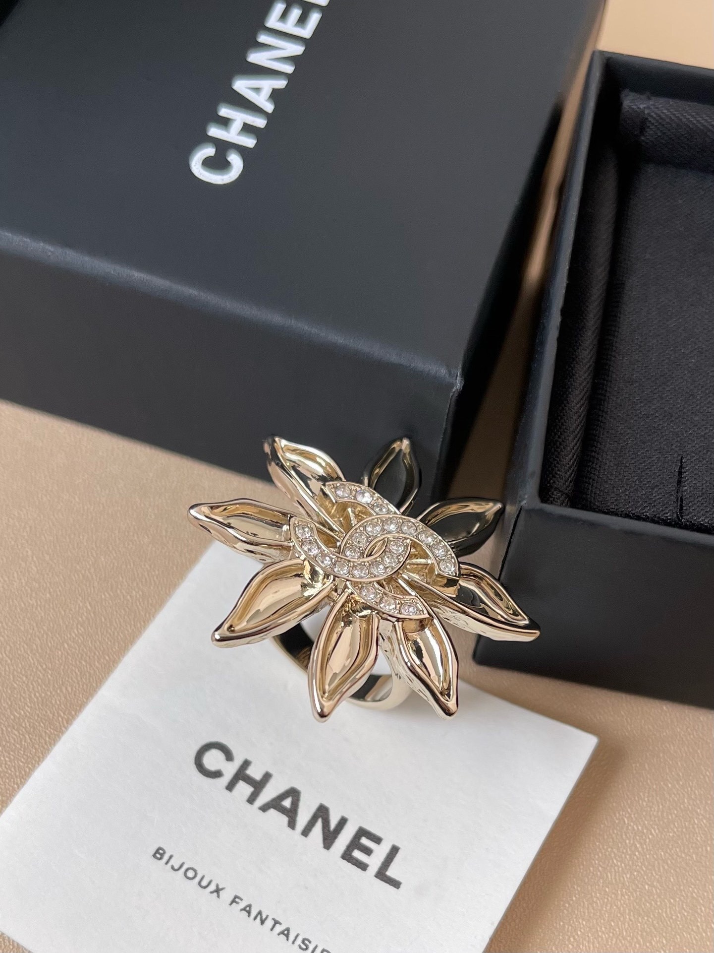 Chanel Crystal Flower Statement Ring - Elegant Gold-Tone Jewelry