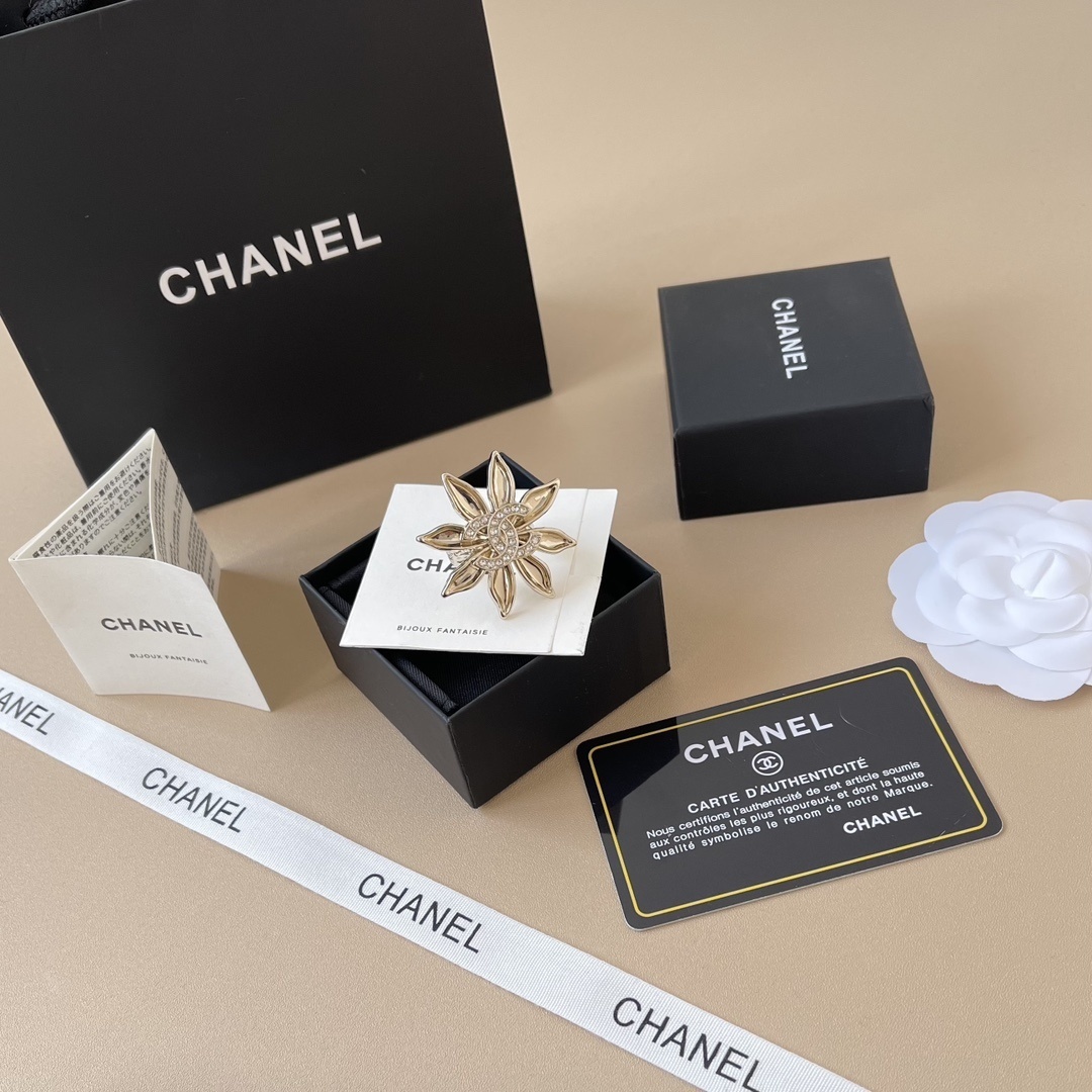 Chanel Crystal Flower Statement Ring - Elegant Gold-Tone Jewelry