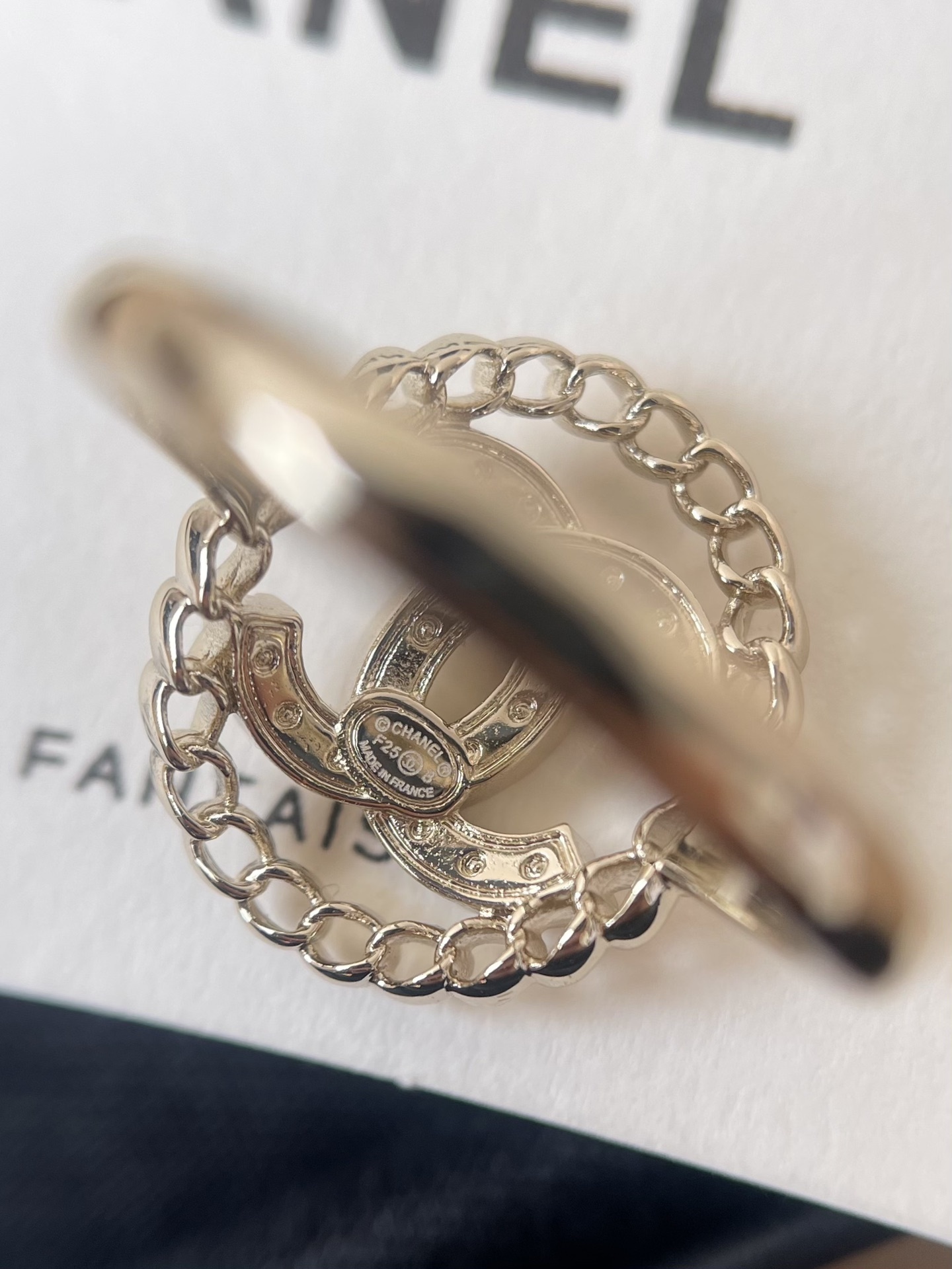 Chanel CC Logo Crystal Ring with Chain Border - Elegant Luxury