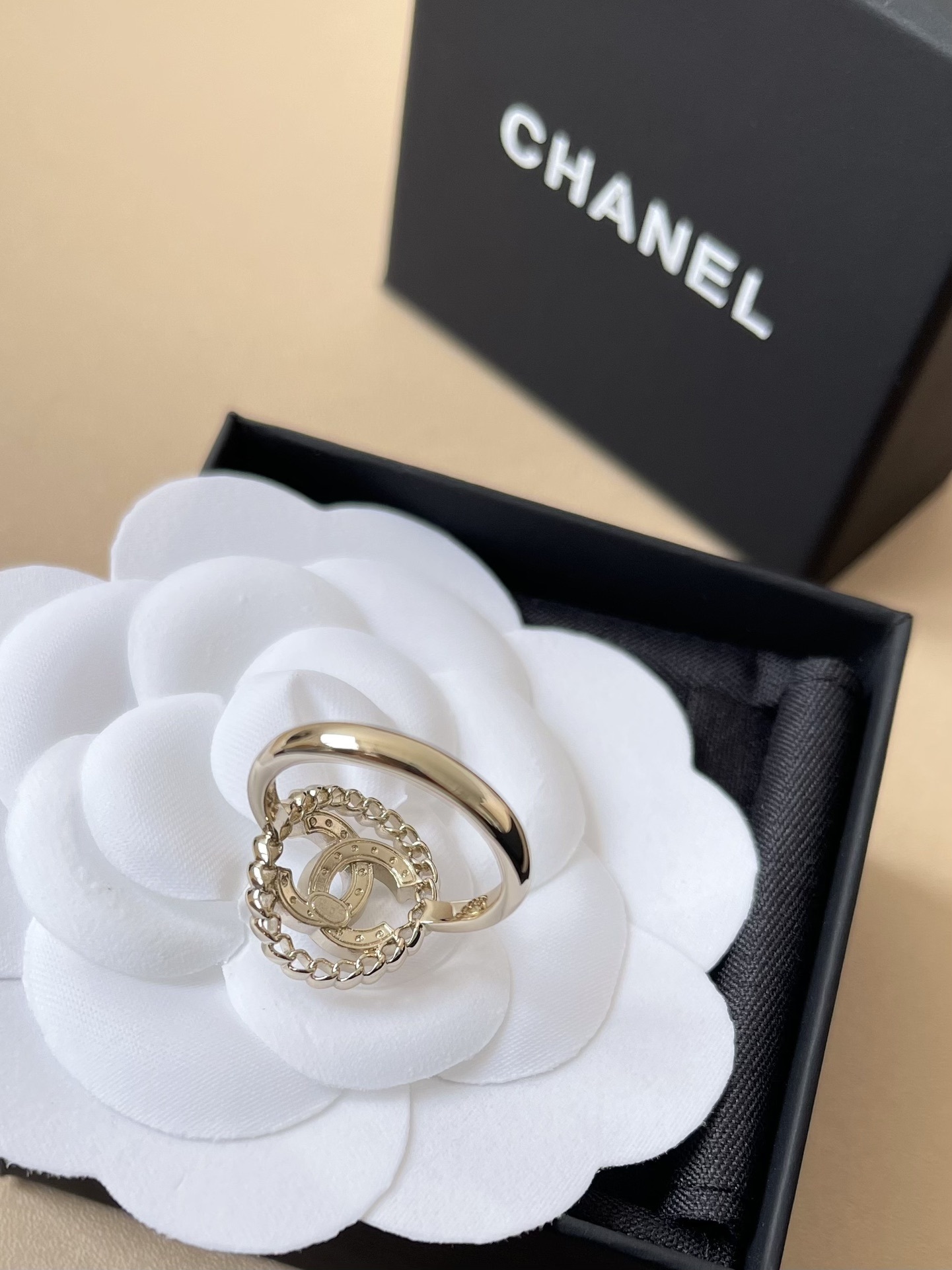 Chanel CC Logo Crystal Ring with Chain Border - Elegant Luxury
