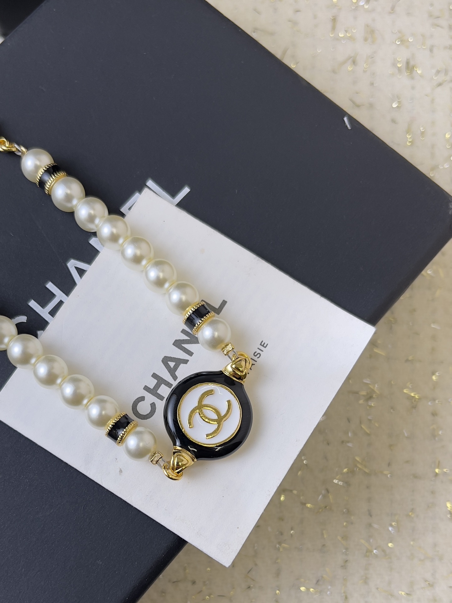 Chanel Pearl Bracelet with Black & White Enamel CC Logo - Gold Tone