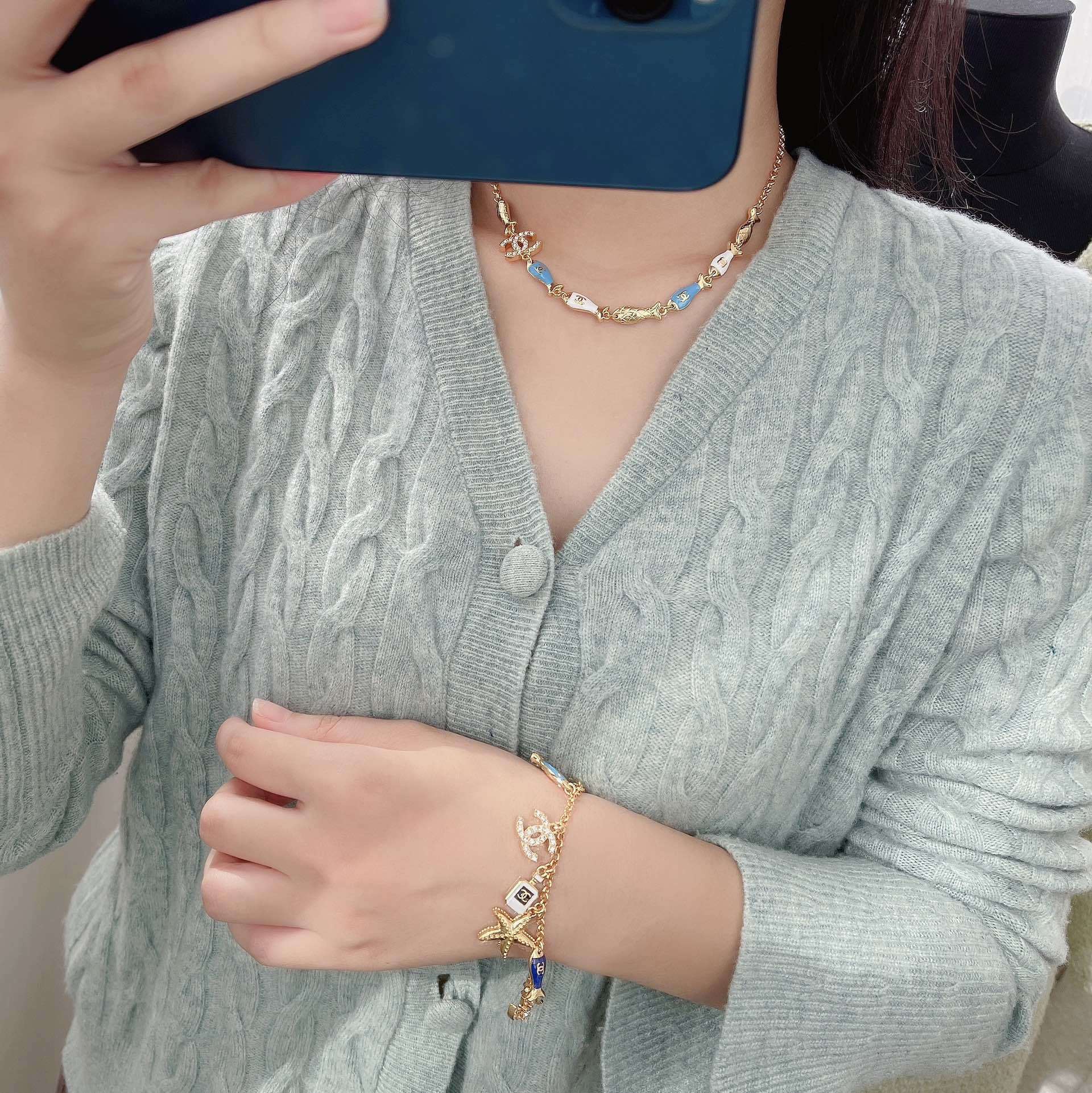 Luxury Gold Marine Charm Bracelet with Starfish and CC Logo