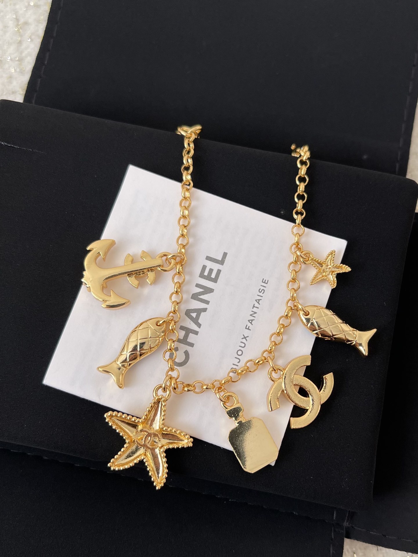 Luxury Gold Marine Charm Bracelet with Starfish and CC Logo