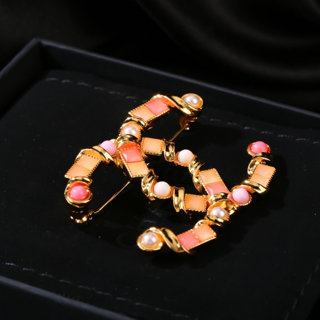 Luxury Chanel CC Gold Brooch with Coral Stones and Pearls