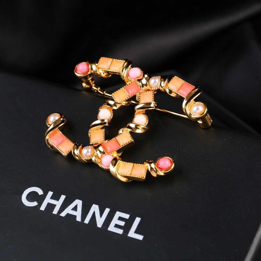 Luxury Chanel CC Gold Brooch with Coral Stones and Pearls