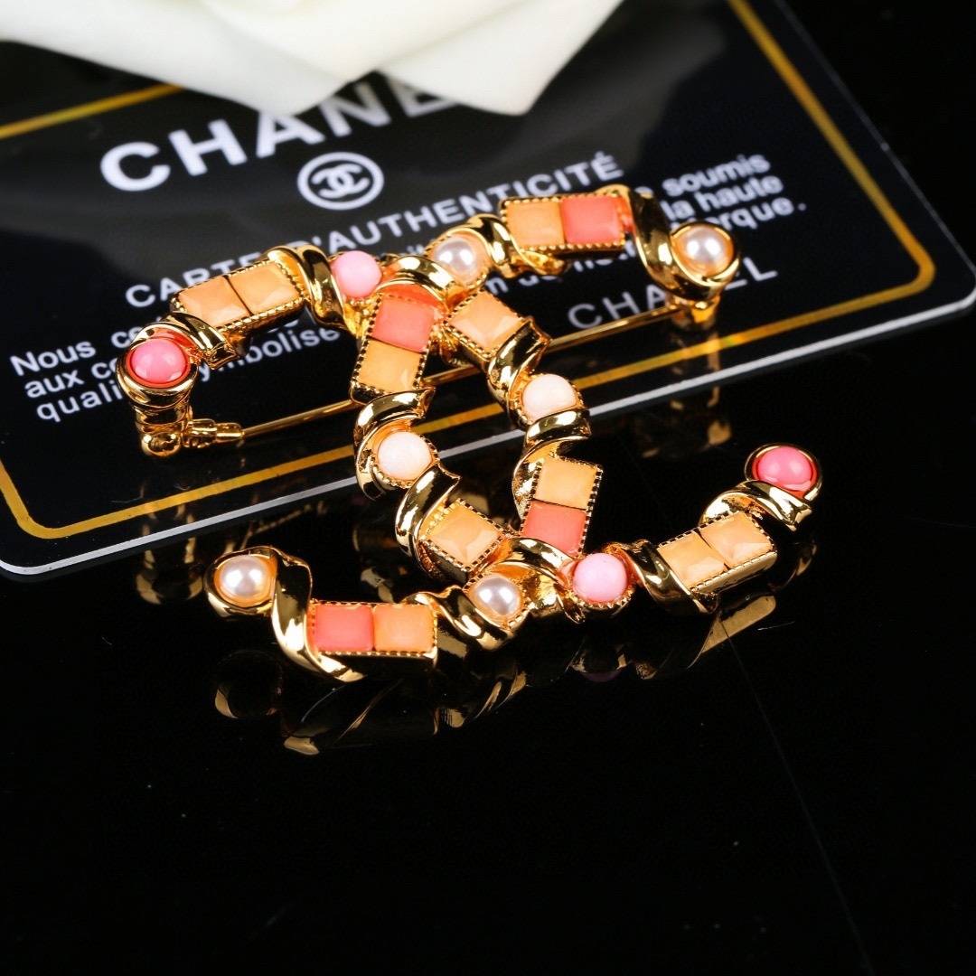 Luxury Chanel CC Gold Brooch with Coral Stones and Pearls