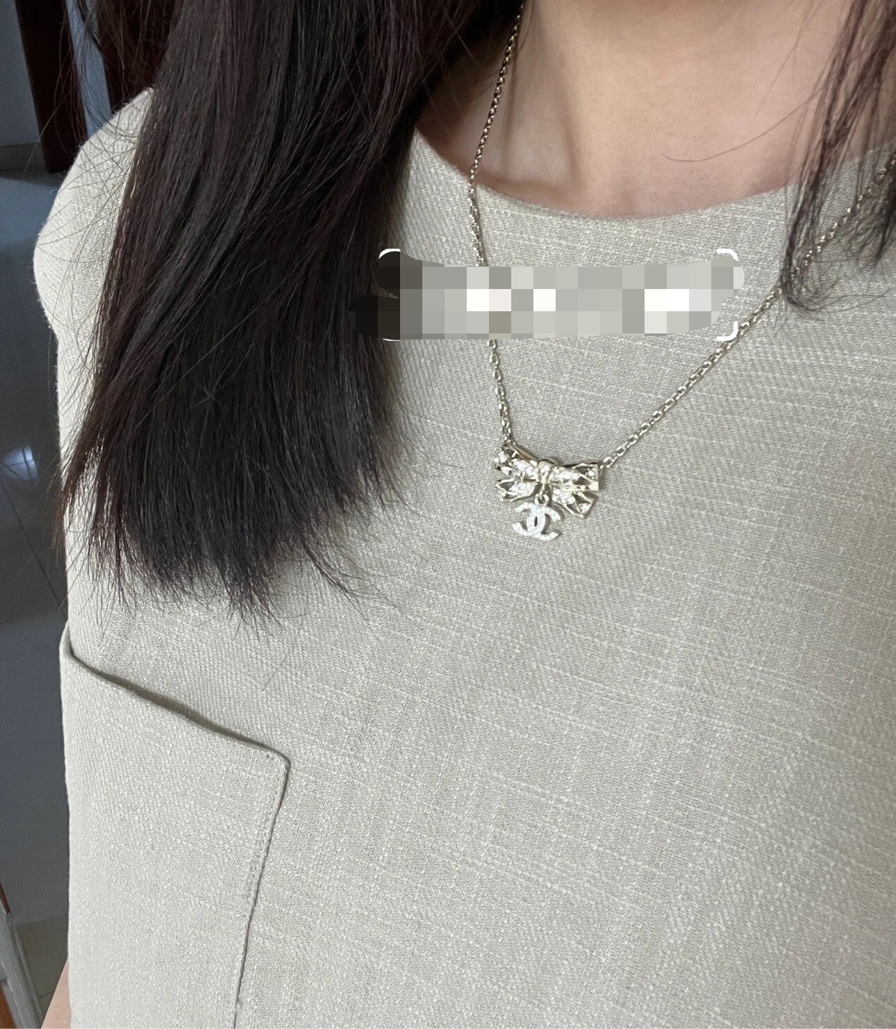 Elegant Gold Ribbon Bow Necklace with Sparkling CC Pendant