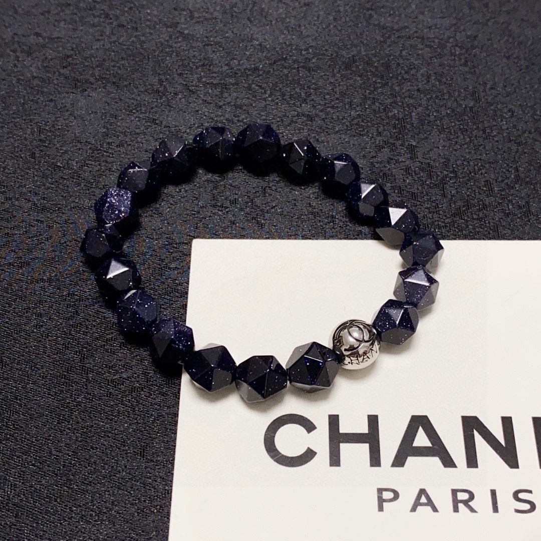 Blue Sandstone Faceted Bead Bracelet with Silver Logo Charm