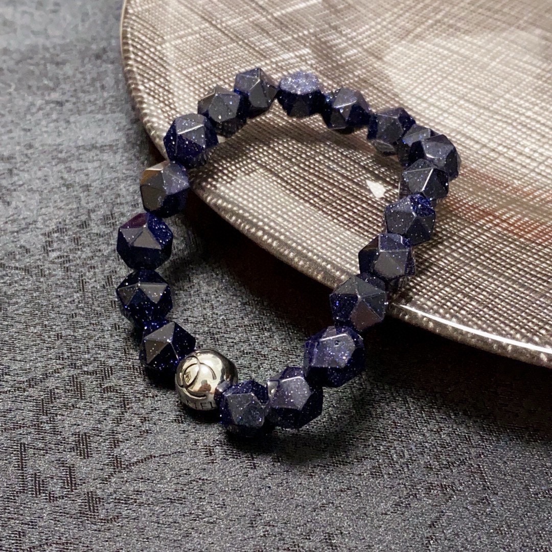 Blue Sandstone Faceted Bead Bracelet with Silver Logo Charm