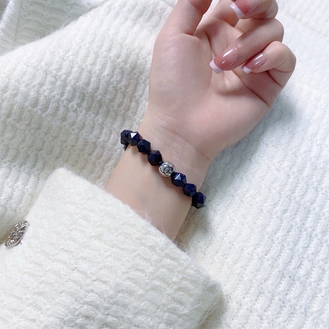 Blue Sandstone Faceted Bead Bracelet with Silver Logo Charm